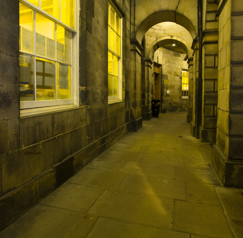 Scotland, Edinburgh, Parliament Square. Covered walkway at Parliament House, originally home of the Scottish Parliament but now host to the Supreme Courts of Scotland.