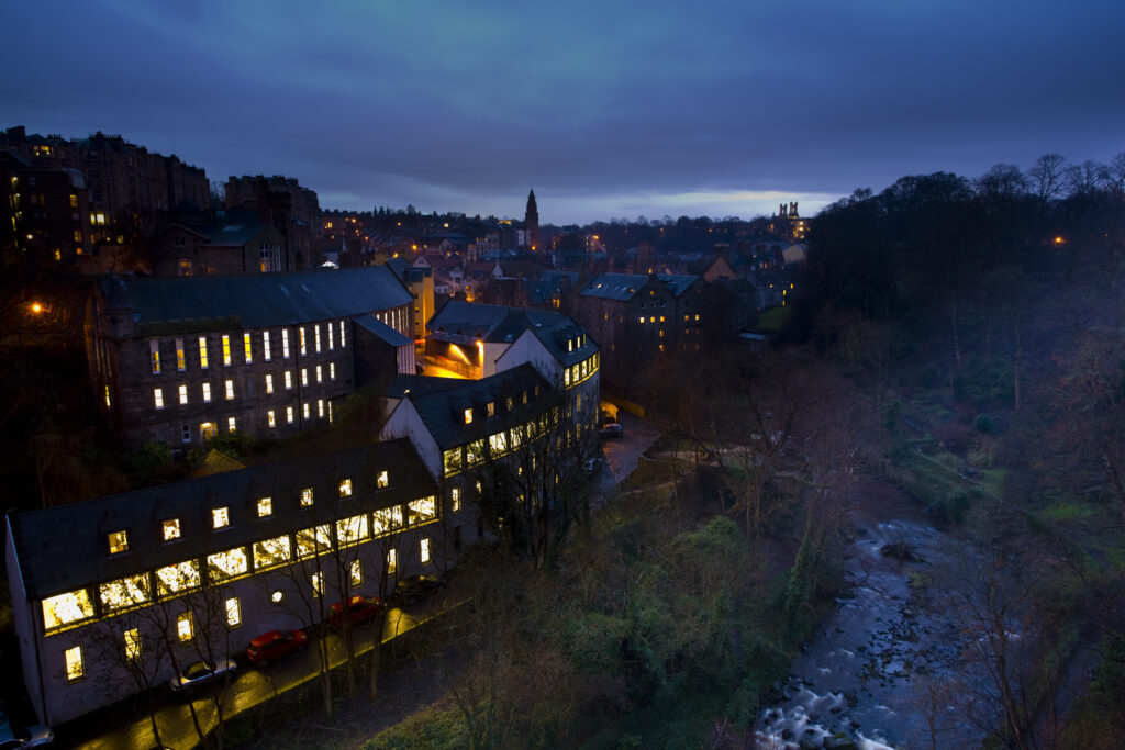 Scotland, Edinburgh, Edinburgh City. Looking west from Dean Bridge towards Miller Row and the Dean Gardens. The Water of Leith Walkway running alongside the river is a popular 12 1/4 mile walk stretching from Balerno to Leith.
