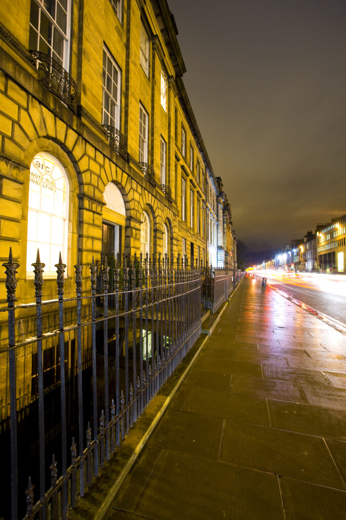 Scotland, Edinburgh, New Town. Albyn Place, with Queen Street and the Queen Street Gardens in the distance.