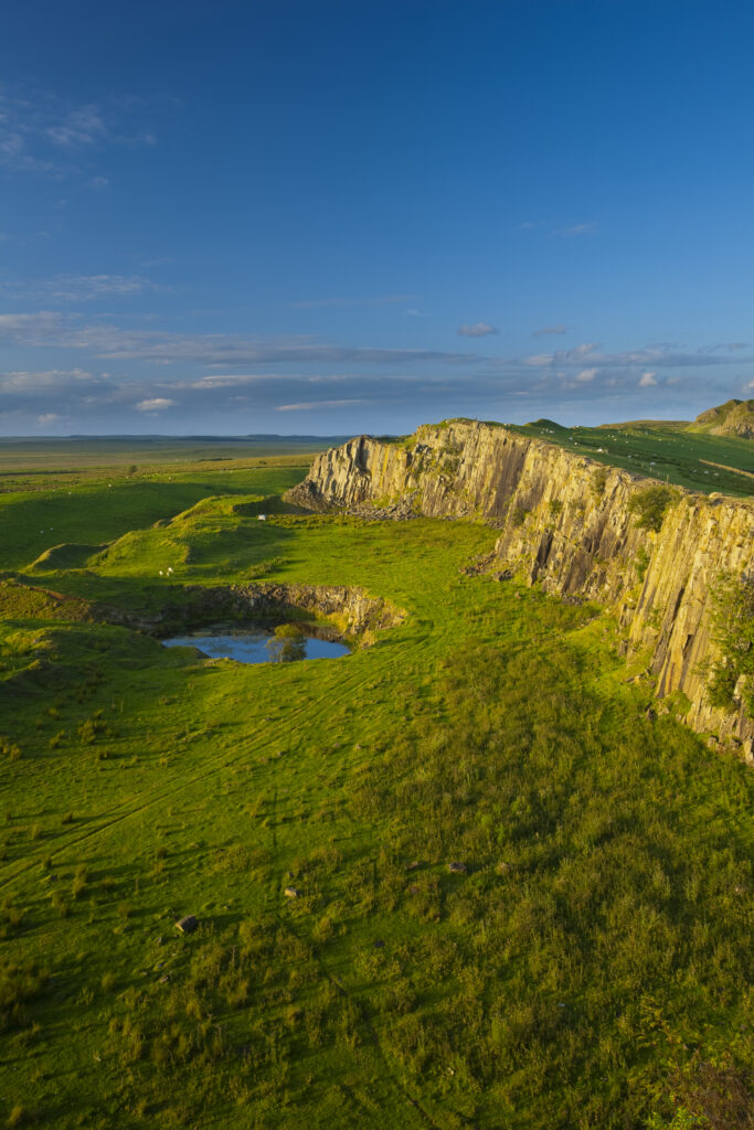 England, Northumberland, Hadrian's Wall. Walltown Crags and the route of Hadrians Wall along the Great Whin Sill.