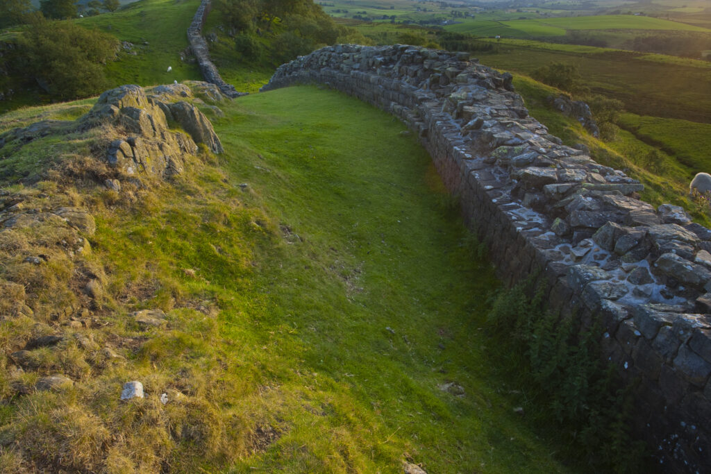 England, Northumberland, Hadrian's Wall. A dramatic stretch of Hadrians Wall running along the Walltown Craggs.