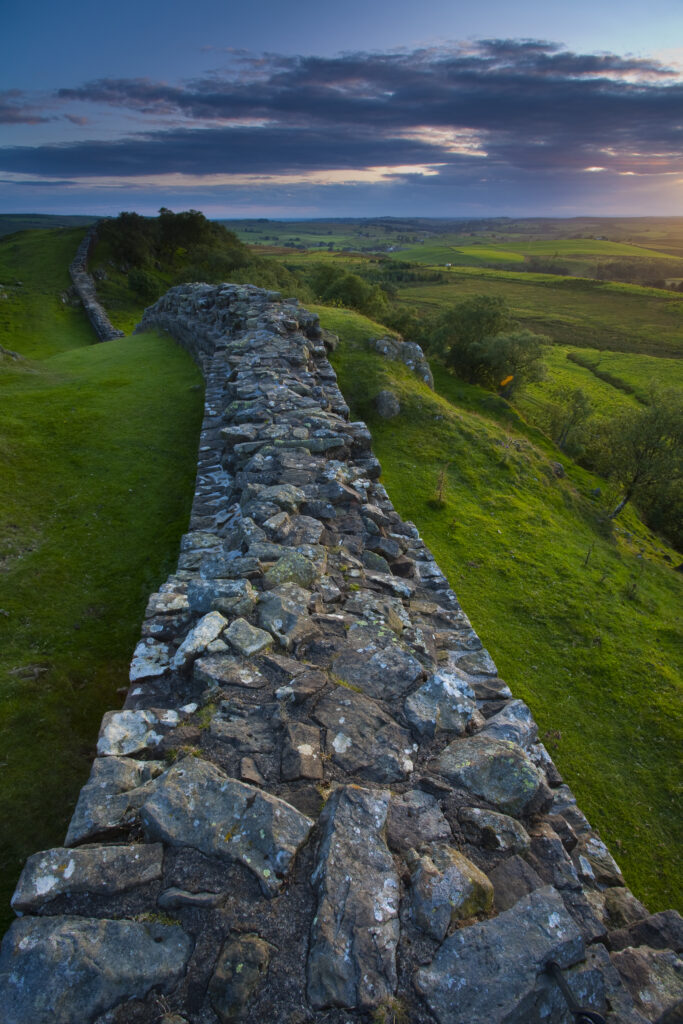 England, Northumberland, Hadrian's Wall. A dramatic stretch of Hadrians Wall running along the Walltown Craggs.