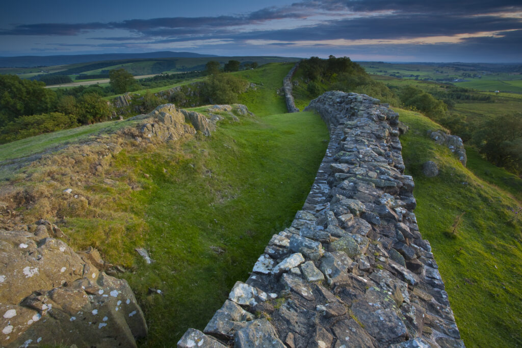 England, Northumberland, Hadrian's Wall. A dramatic stretch of Hadrians Wall running along the Walltown Craggs.