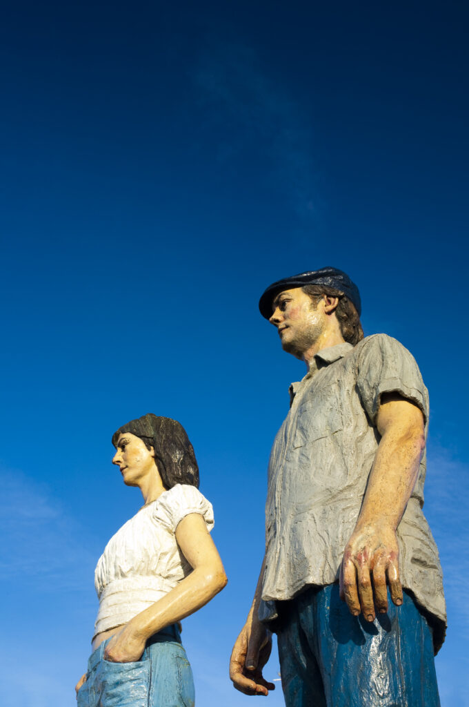 England, Northumberland, Newbiggin by the sea. 'The Couple' a sculpture by the artist and sculptor Sean Henry, located near the coast of Newbiggin by the Sea.