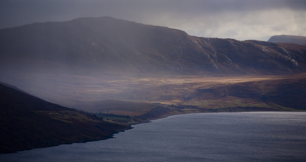 Scotland, Scottish Highlands, Little Loch Broom. Rain clears revealing the mountain peaks surrounding Little Loch Broom.