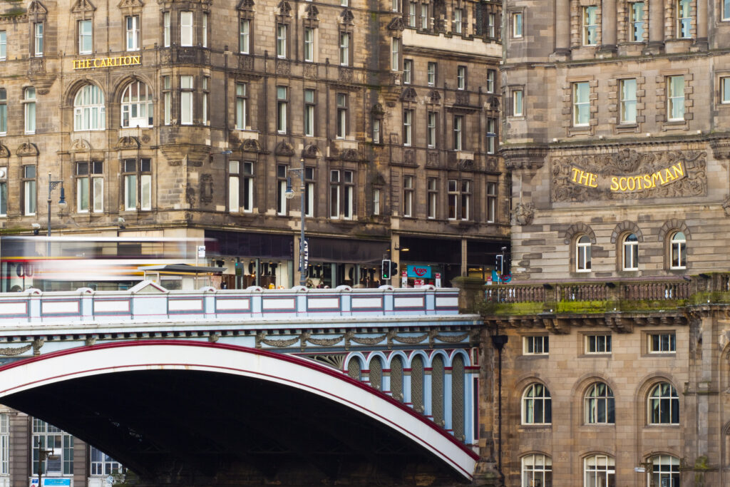Scotland, Edinburgh, Edinburgh City. The Scotsman Building alongside the North Bridge, linking Princes Street with the Edinburgh Old Town.