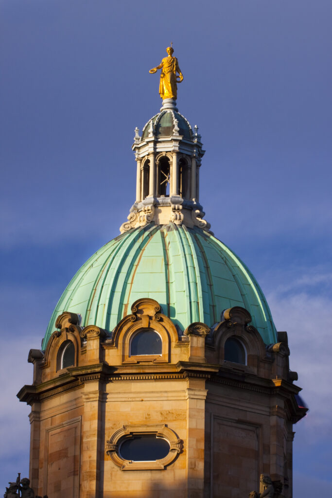 Scotland, Edinburgh, Bank of Scotland. Florentine style central dome on the Royal Bank of Scotland building located on the Mound. Inspired by the 17th century Italian painter and architect, Pietro da Cortona, The dome was topped by a statue of the Greek god, Victory, by sculptor John Rhind.