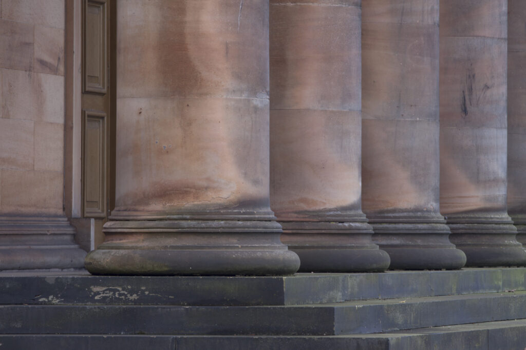 Scotland, Edinburgh, National Gallery of Scotland. Detail view of the grand pillars belonging to the National Gallery of Scotland building.