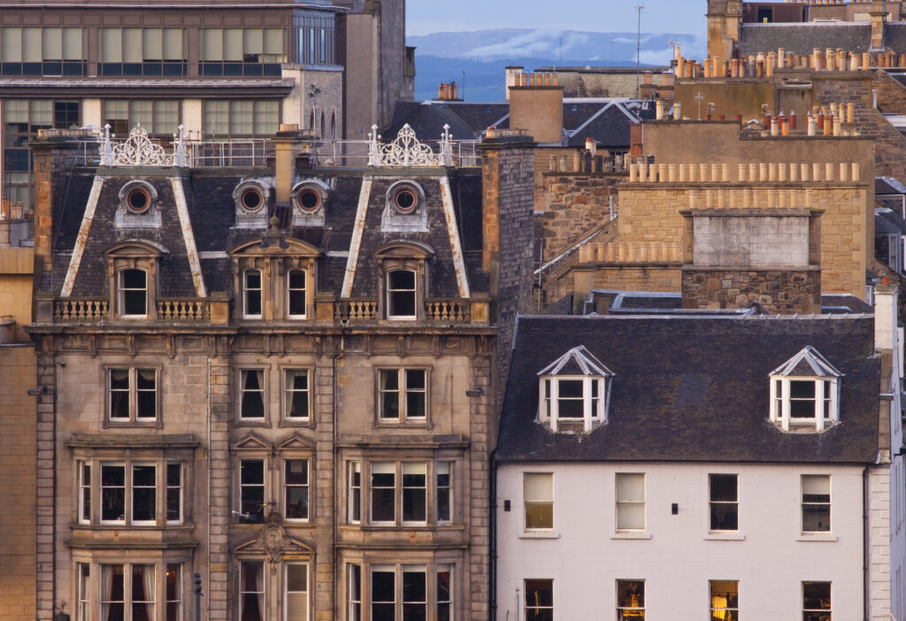 Scotland, Edinburgh, Princes Street. Typical architecture of the shops and offices located along Princes Street.