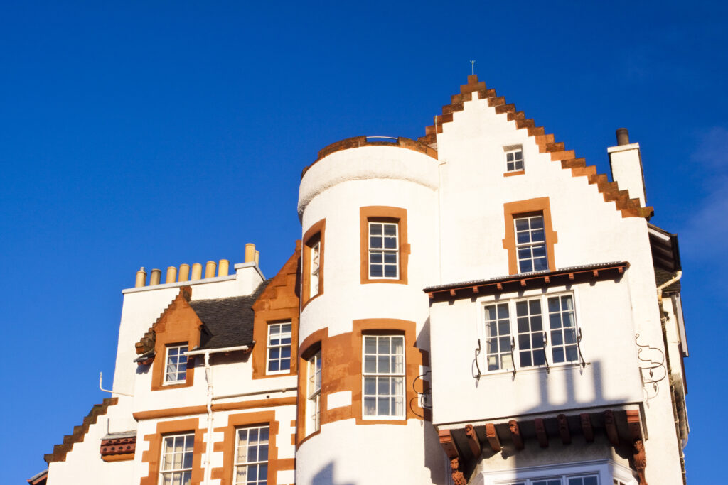 Scotland, Edinburgh, Edinburgh City. House with white washed walls, located near the castle esplanade.