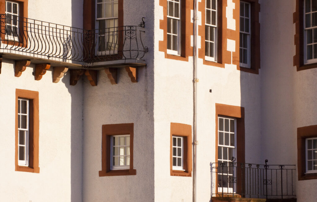 Scotland, Edinburgh, Edinburgh City. House with white washed walls, located near the castle esplanade.