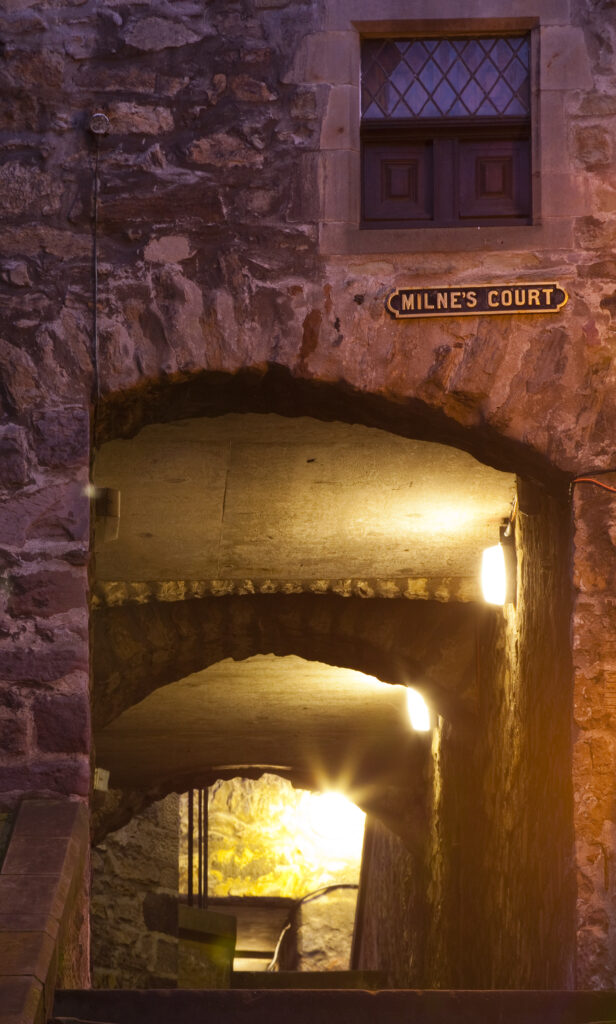 Scotland, Edinburgh, Old Town. Milne's Court, a narrow passageway heading to the Royal Mile.