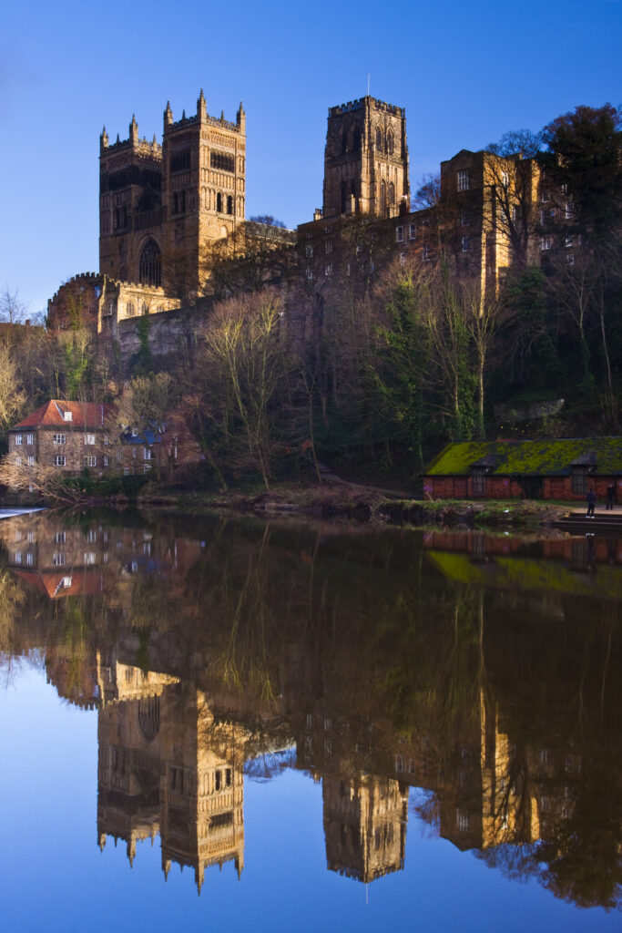 England, County Durham, Durham City. Durham Cathedral, situated above the river banks of the River Wear.
