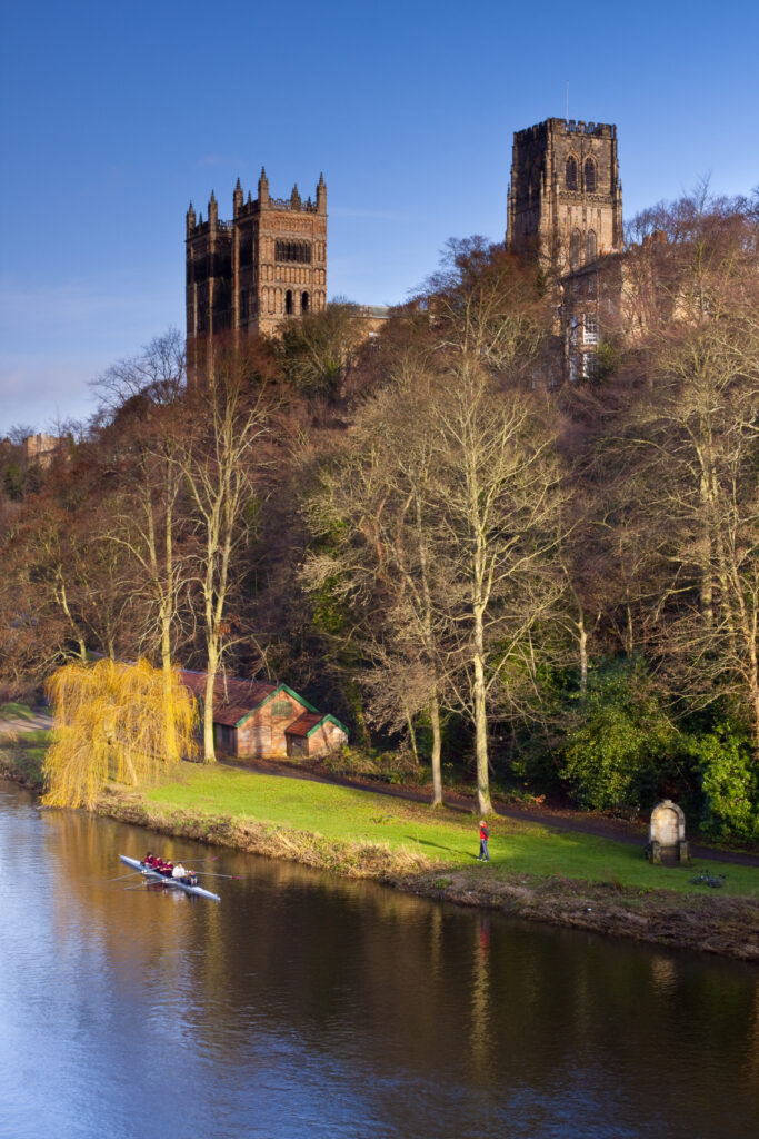England, County Durham, Durham City. Durham Cathedral, situated above the river banks of the River Wear.