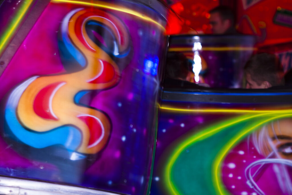 England, Lancashire, Blackpool. Waltzer fairground ride on the Central Pier.