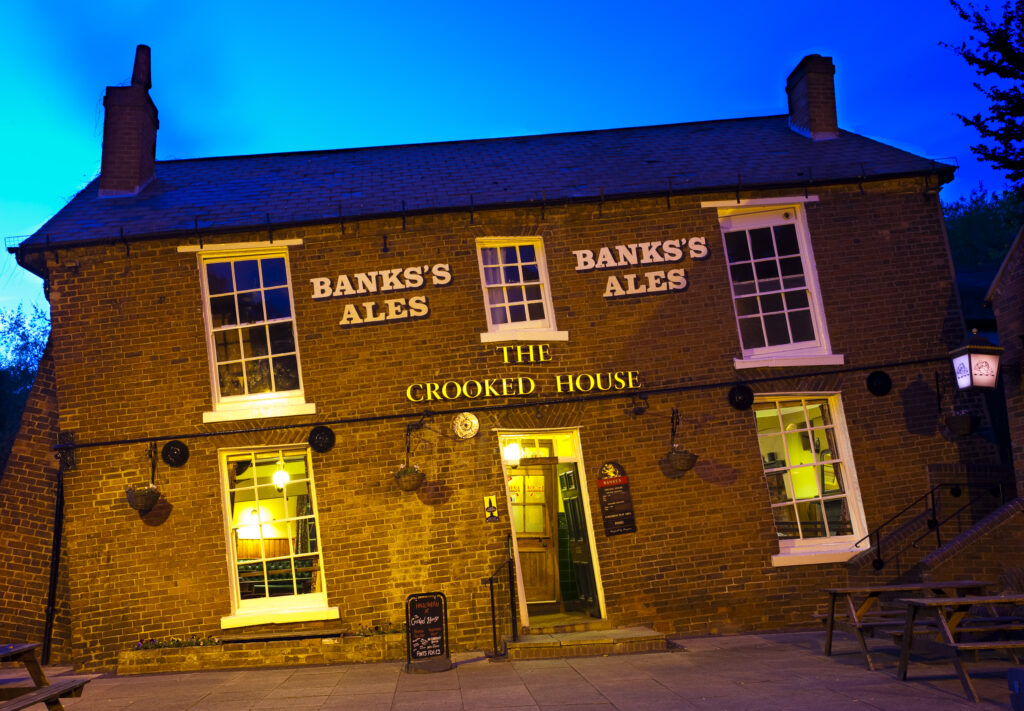 England, Staffordshire, Himley. The Glynne Arms (more popularly known as the Crooked House or The Siden House) - A public house near Dudley that has suffered badly from mining subsidence.
