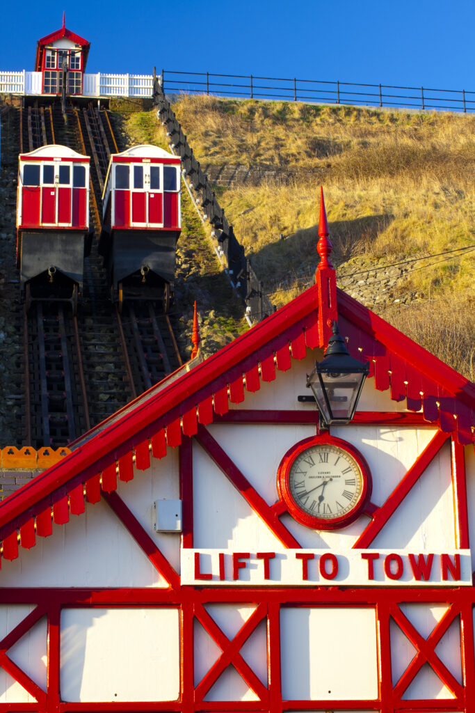 England, Cleveland, Saltburn-by-the-Sea. View looking towards the top of the funicular railway, one of the world's oldest water-powered cliff lifts, from the station near the pier.