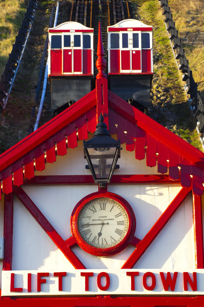 England, Cleveland, Saltburn-by-the-Sea. View looking towards the top of the funicular railway, one of the world's oldest water-powered cliff lifts, from the station near the pier.