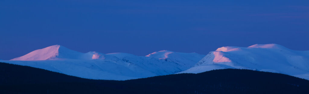Scotland, Scottish Highlands, Cairngorms National Park. The Cairngorms Massif, viewed at dawn from Grantown on Spey.