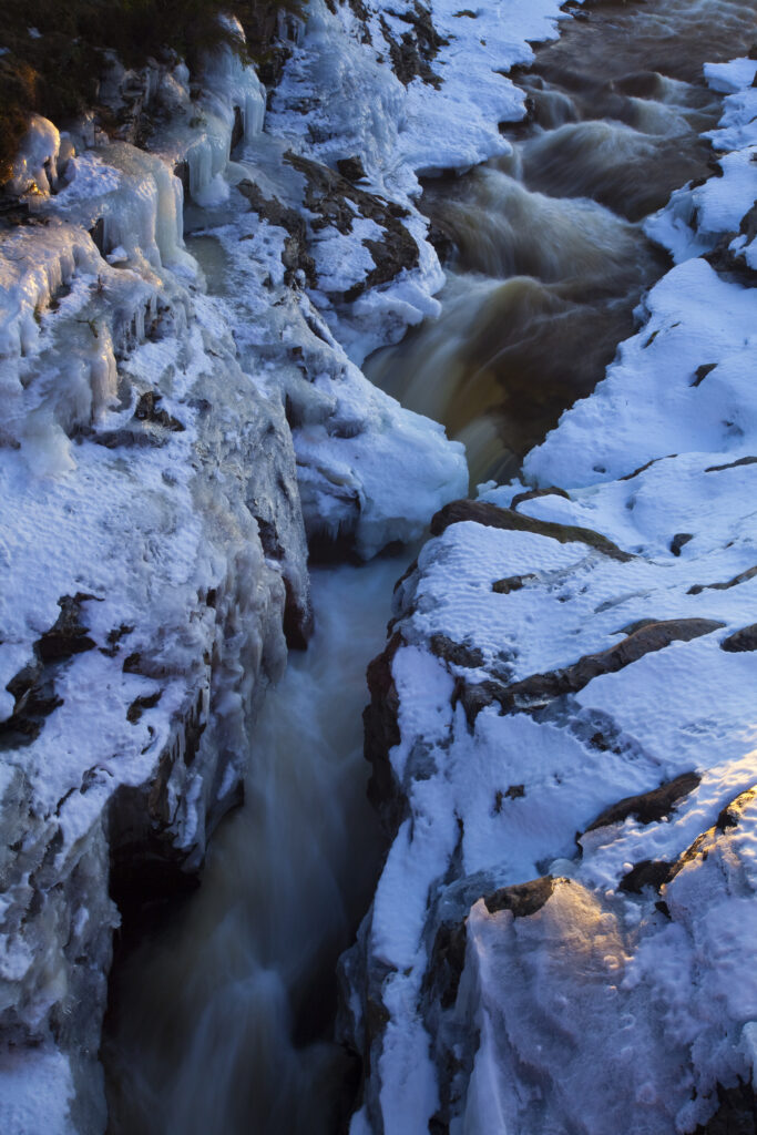 Scotland, Aberdeenshire, Linn of Dee. Snow and ice covered Linn of Dee, a stretch of the River Dee that flows through a dramatic natural gorge near Braemar.