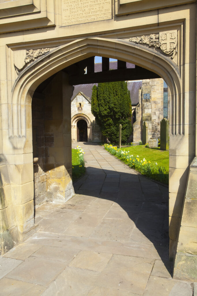 England, Northumberland, Corbridge. Grand entrance to the graveyard and grounds of the Saxon Church of St Andrews in Corbridge.
