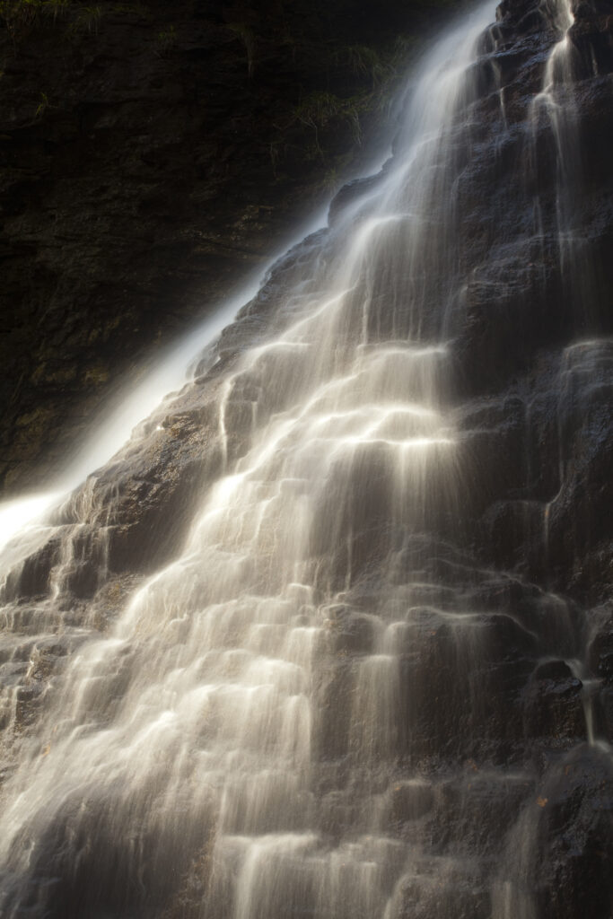 England, Northumberland, Hareshaw Linn. Hareshaw Linn is a spectacular waterfall located in a steep sided gorge, which continues to flow through a wooded valley. Hareshaw Linn is located near Bellingham within the Northumberland National Park.