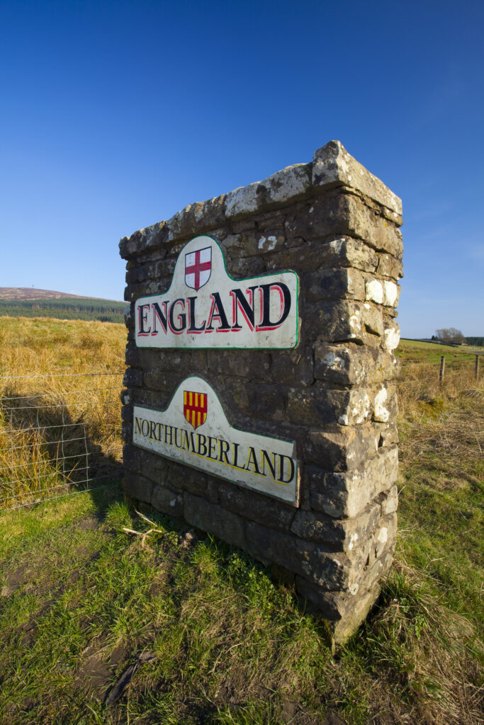 Scotland, Scottish Borders, England Border near Kielder in Northumberland. England and Northumberland sign near Kielder viewed from the Scottish side of the Border