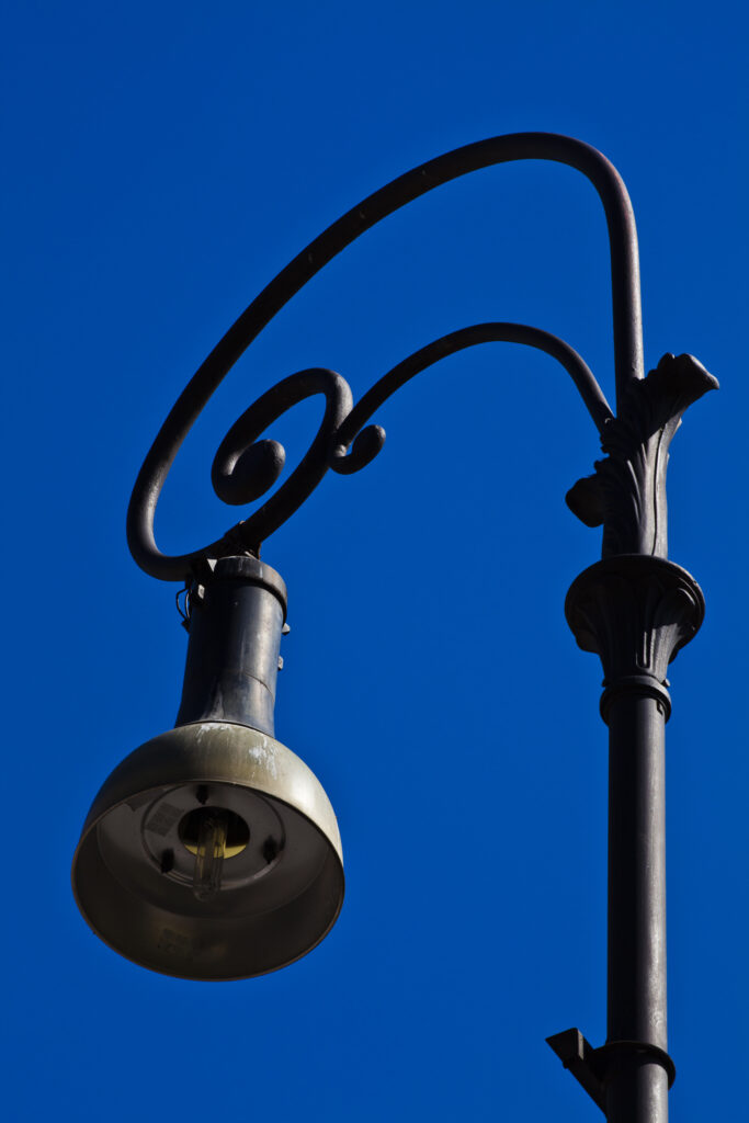 Italy, Lazio, Rome. Ornate street lamp by the Colosseum.