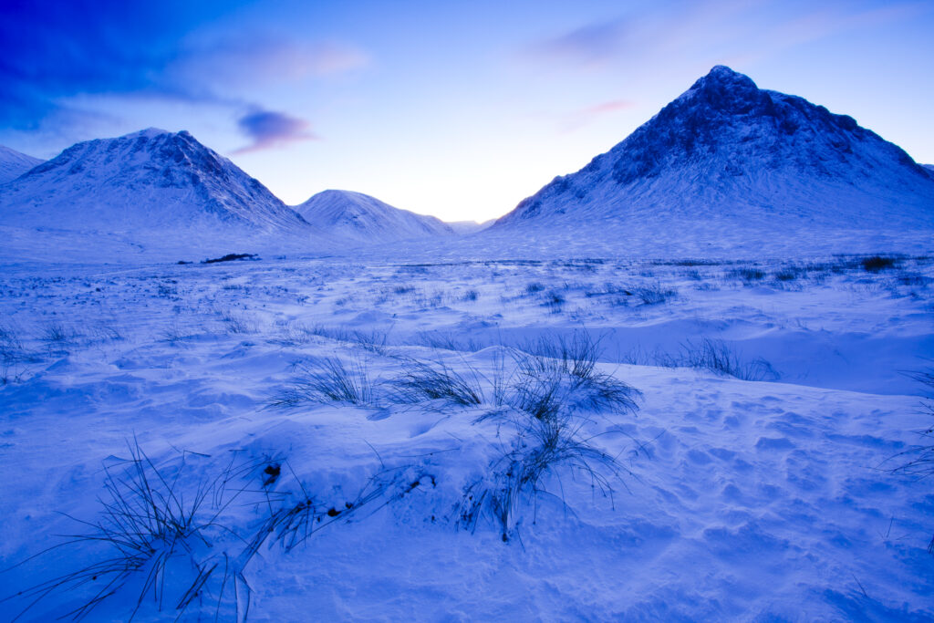Scotland, Scottish Highlands, Pass of Glencoe. Looking towards the snow covered peaks of Glen Etive.