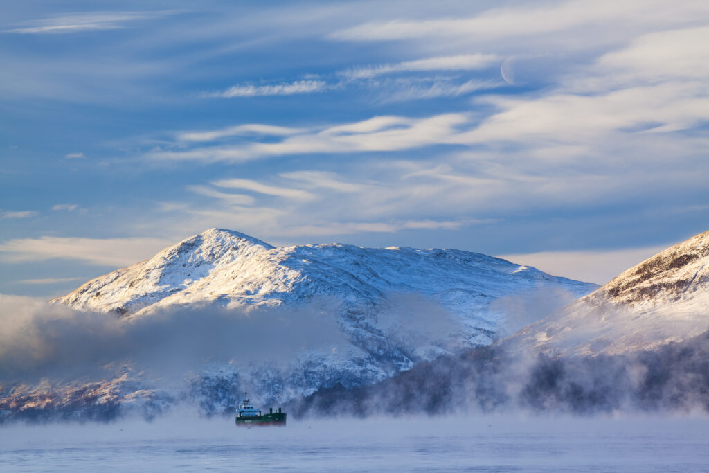 Scotland, Scottish Highlands, Fort William. Mist rising from Loch Linnhe near Fort William, shortly after dawn during winter.