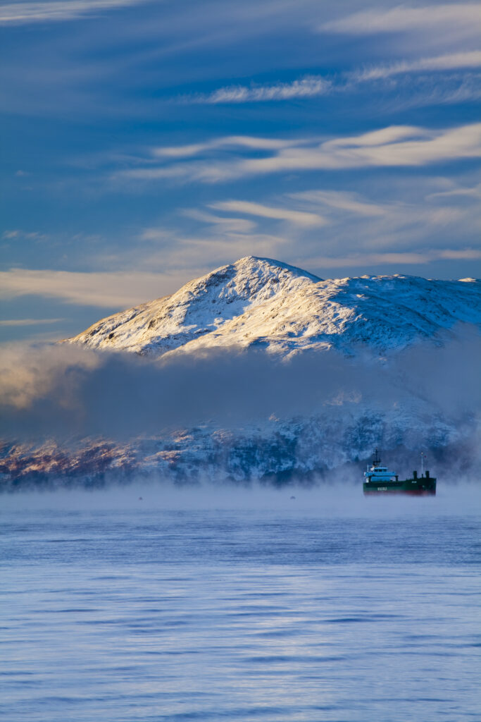 Scotland, Scottish Highlands, Fort William. Mist rising from Loch Linnhe near Fort William, shortly after dawn during winter.