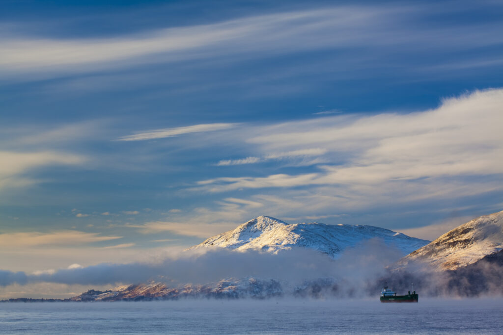 Scotland, Scottish Highlands, Fort William. Mist rising from Loch Linnhe near Fort William, shortly after dawn during winter.