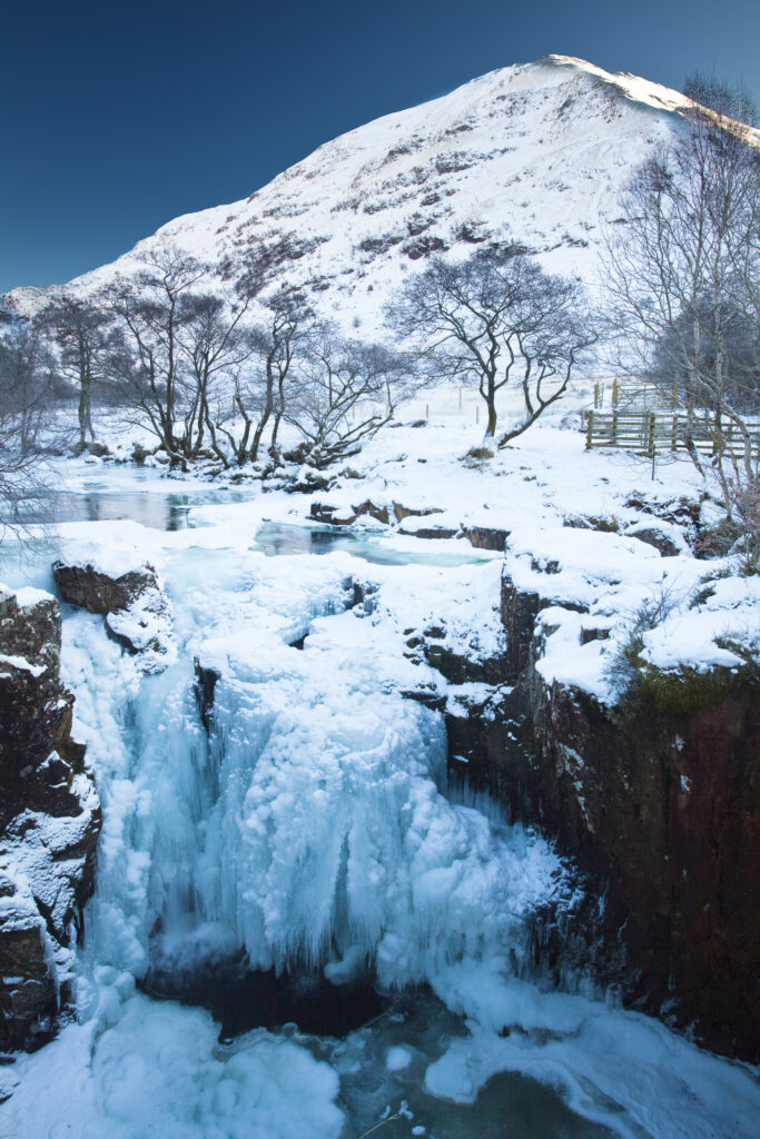 Scotland, Scottish Highlands, Glen Nevis. The frozen Lower Falls located Glen Nevis under the shadow of Ben Nevis.