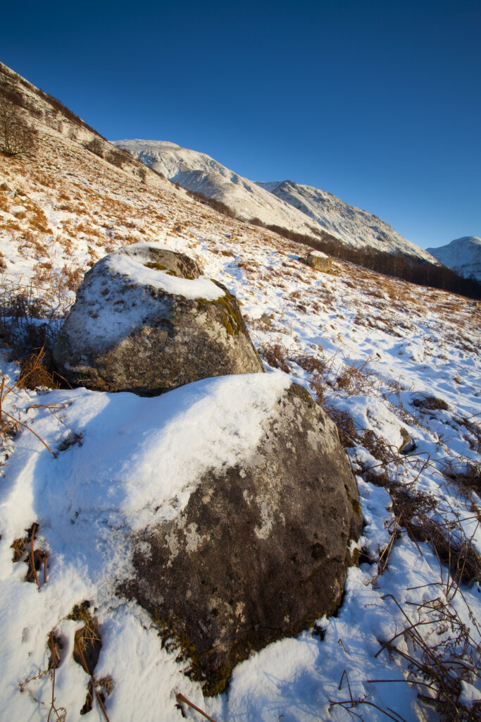 Scotland, Scottish Highlands, Glen Nevis. The snow covered Glen Nevis, looking towards Carn Dearg on the lower slopes of the highest mountain to be found in Scotland and the UK - Ben Nevis.