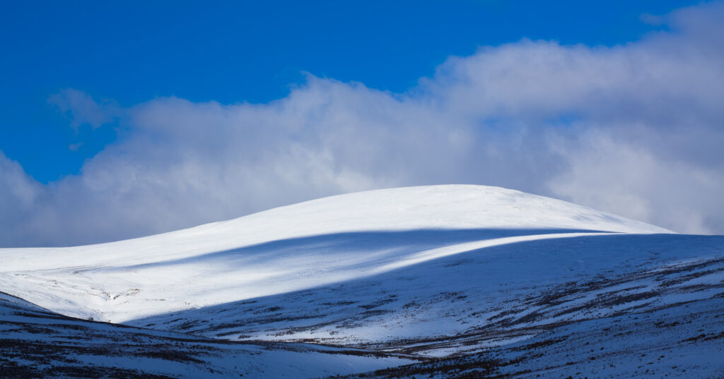 England, Northumberland, Northumberland National Park. Snow on the Cheviot Hills near Comb Fell and the Breamish Valley.