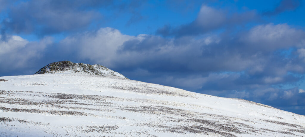 England, Northumberland, Northumberland National Park. Snow on the Cheviot Hills near Comb Fell and the Breamish Valley.
