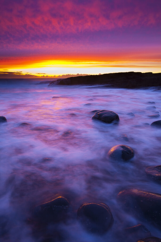 England, Northumberland, Cullernose Point. Colouful sunrise near Cullernose Point along the Northumberland Heritage Coast.