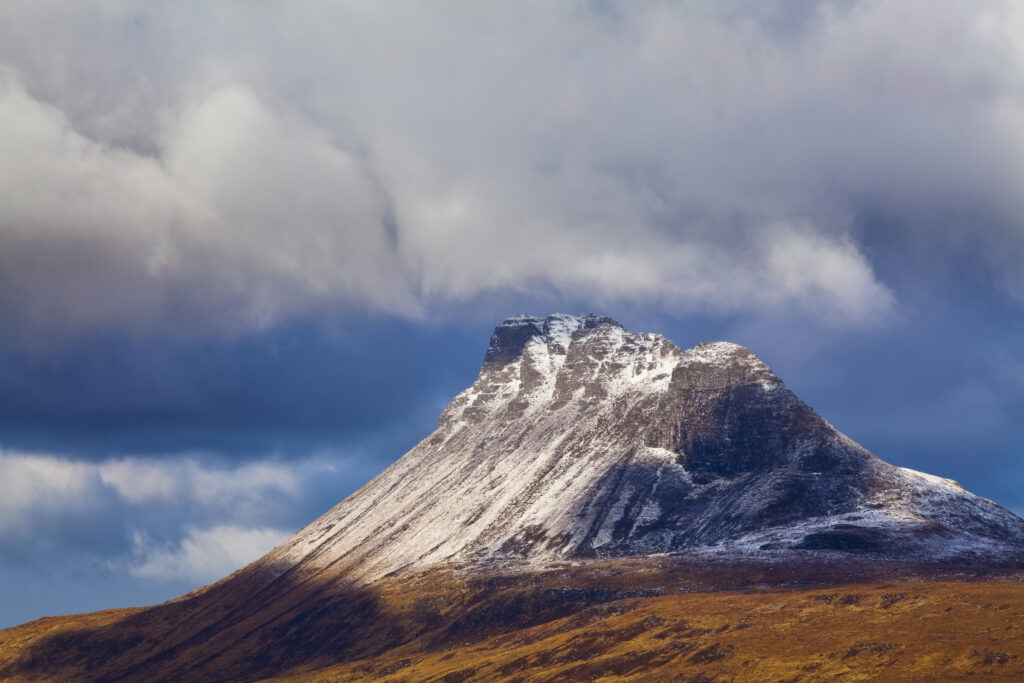 Scotland, Scottish Highlands, Assynt. Stac Pollaidh (also know as "Stack Polly") is an impressive mountain found in the Assynt area, located north of Ullapool. Despite its dramatic appearance, it is only 613 metres (2009 feet) in height.