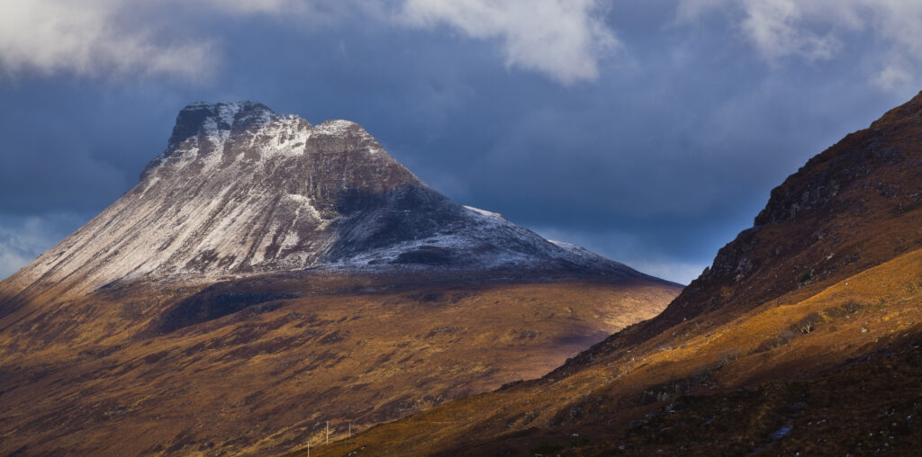 Scotland, Scottish Highlands, Assynt. Stac Pollaidh (also know as "Stack Polly") is an impressive mountain found in the Assynt area, located north of Ullapool. Despite its dramatic appearance, it is only 613 metres (2009 feet) in height.