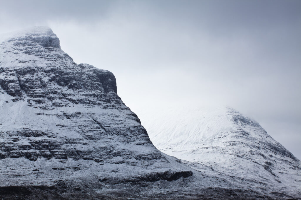 Scotland, Scottish Highlands, Assynt. The dramatic features of Quinag, a distinct mountain found in the North West Highlands Geopark Region.