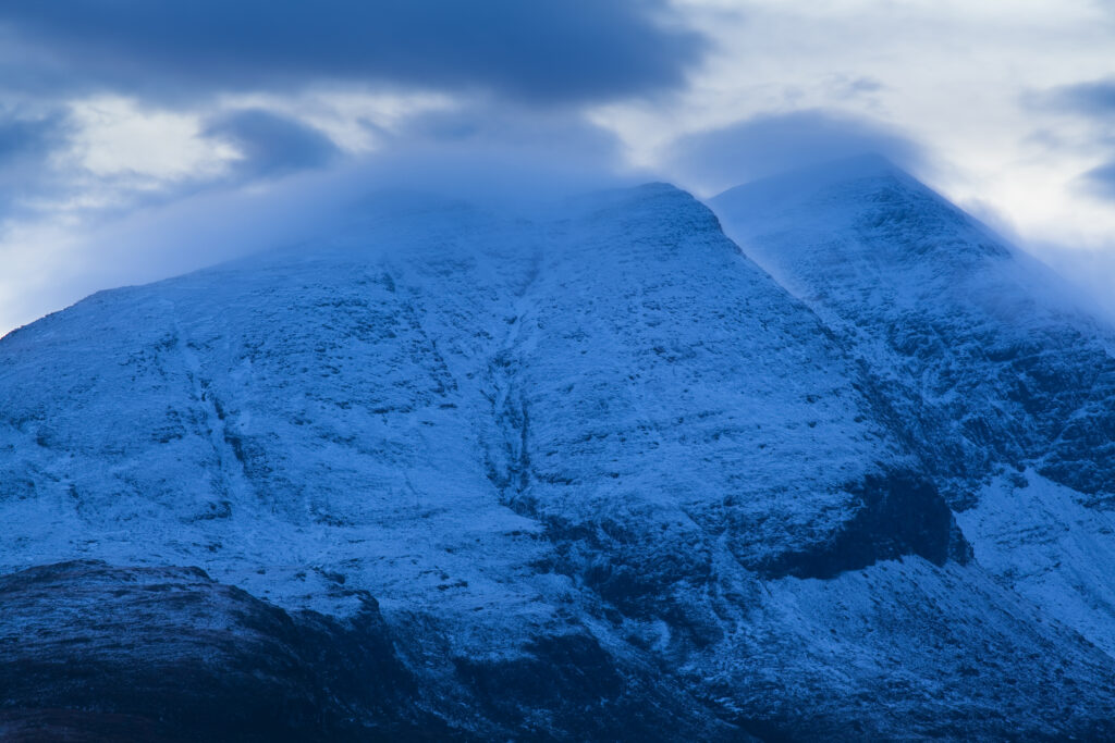 Scotland, Scottish Highlands, Assynt. Clouds clear from the peak of Cùl Beag, a mountain in the Assynt parish of Sutherland.