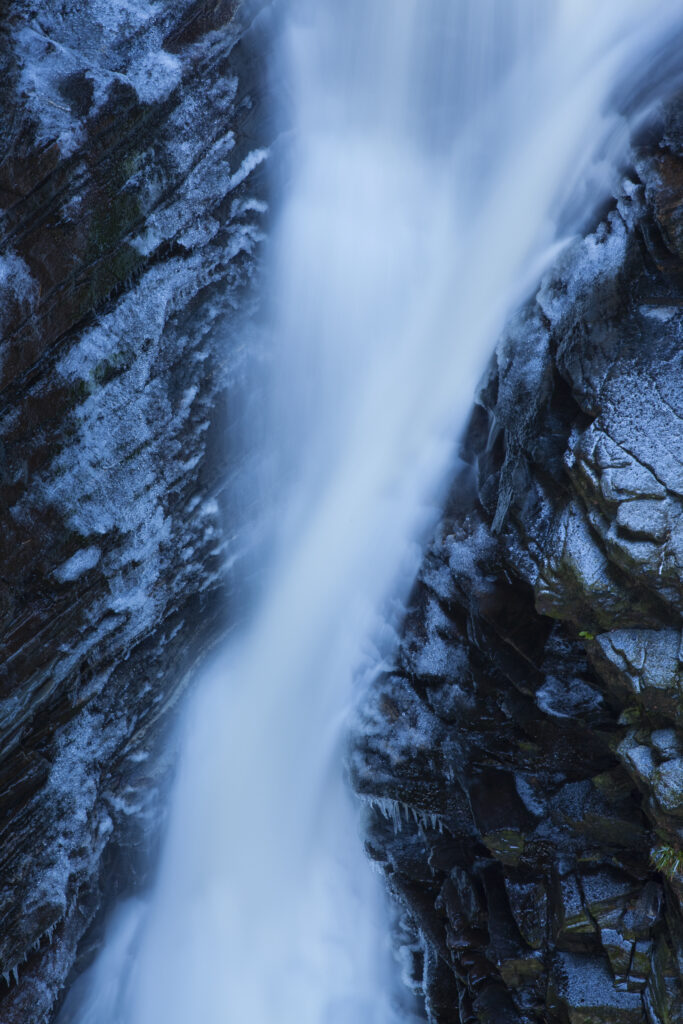 Scotland, Scottish Highlands, Corrieshalloch Gorge and Falls of Measach. The Corrieshalloch Gorge is a spectacular mile-long gorge created by the River Droma which has carved the canyon by eroding through hard metamorphic rock.