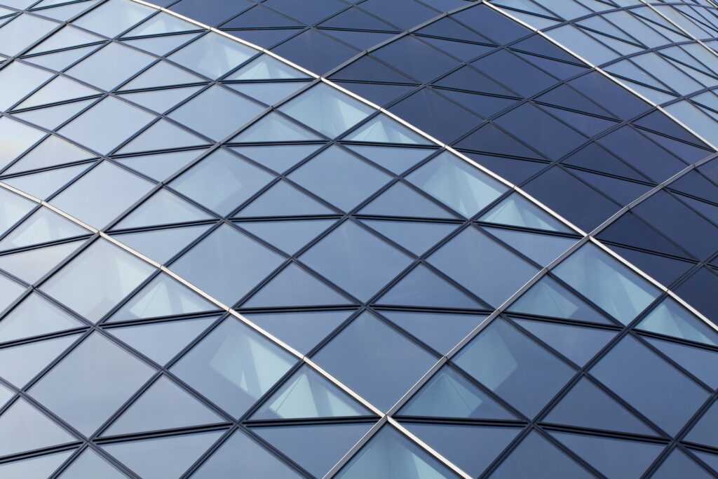 England, Greater London, The City of London. Abstract view of the modern architecture of the famous Gherkin building, in the financial square mile in the City of London.