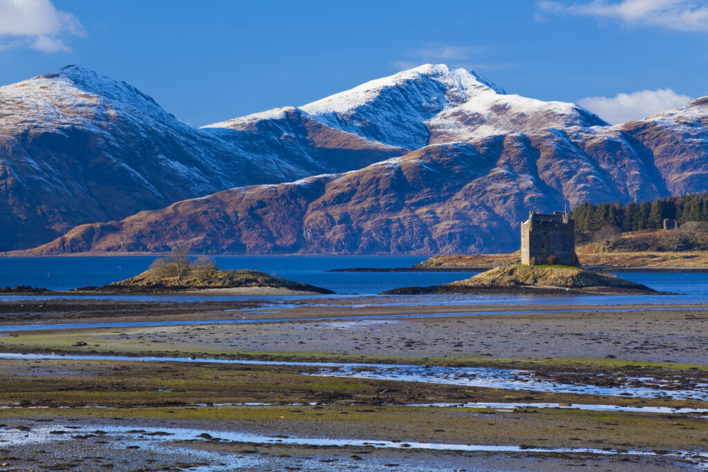 Scotland, Scottish Highlands, Castle Stalker. Castle Stalker near Port Appin is a four story Tower House located on a tidal islet on Loch Laich, an inlet off Loch Linnhe.