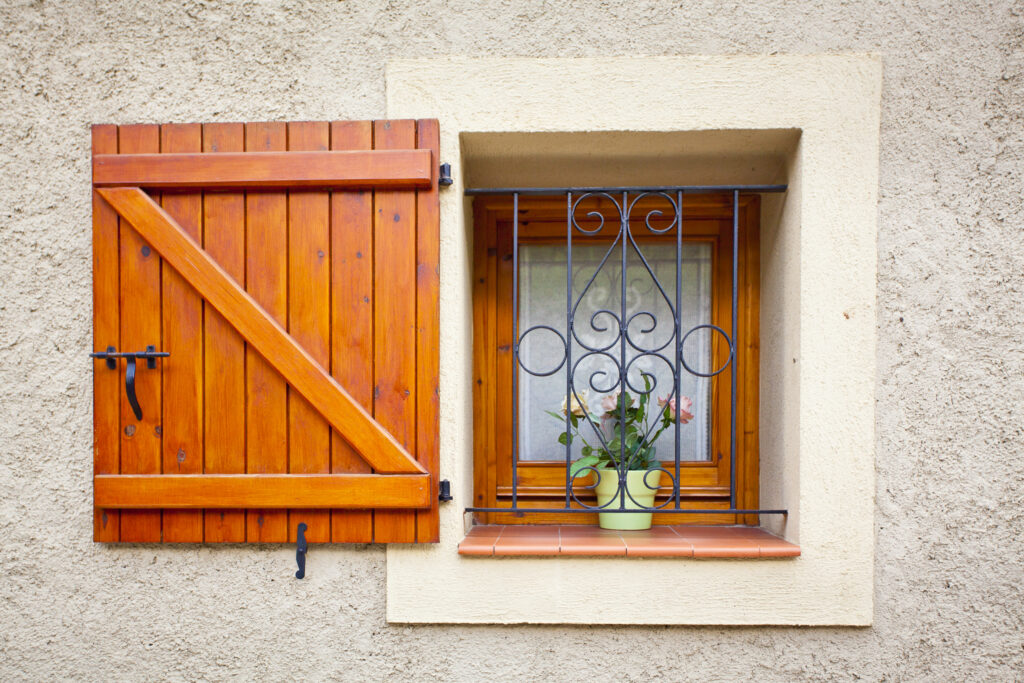 Spain, Catalonia, Pyrenees, Gósol. Detail shot of window and shutter in the Pyranees village of Gosol.