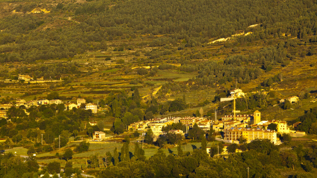 Spain, Catalonia, Pyrenees, Pedraforca. Soft morning light illuminates the village of Saldes at the foothills of the Pedraforca Mountain in the heart of the Cadí-Moixeró Natural Park.