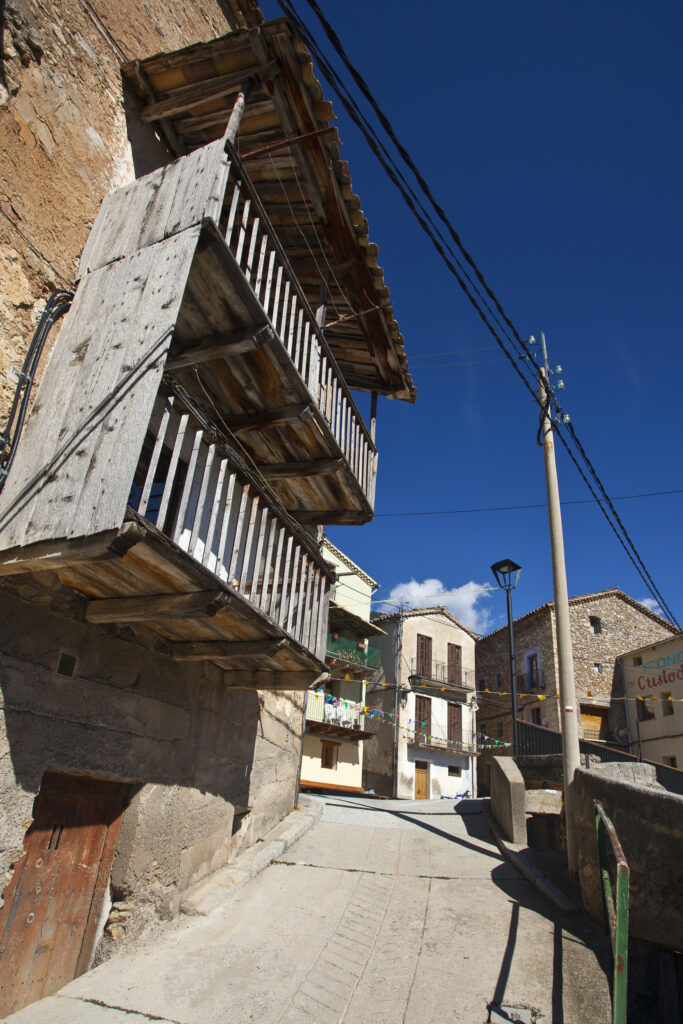 Spain, Catalonia, Pyrenees, Tuixén. Typical Pyrenees buildings and street in the village of Tuixen.