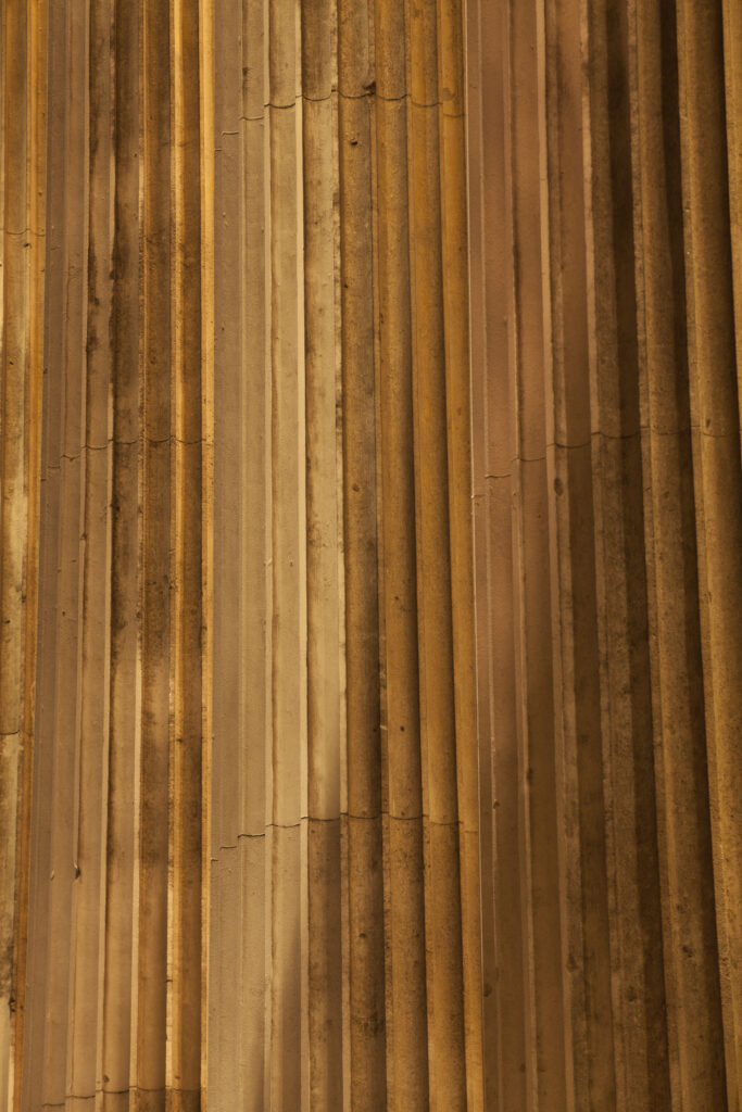 England, Greater London, City of Westminster. Detail shot of pillars belonging to the National Gallery located in Trafalgar Square, a popular tourist destination in London, photographed at dusk.