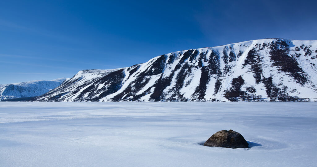 Scotland, Scottish Highlands, Cairngorms National Park. The frozen expanse of Loch Muich, located on the royal estate of Balmoral.
