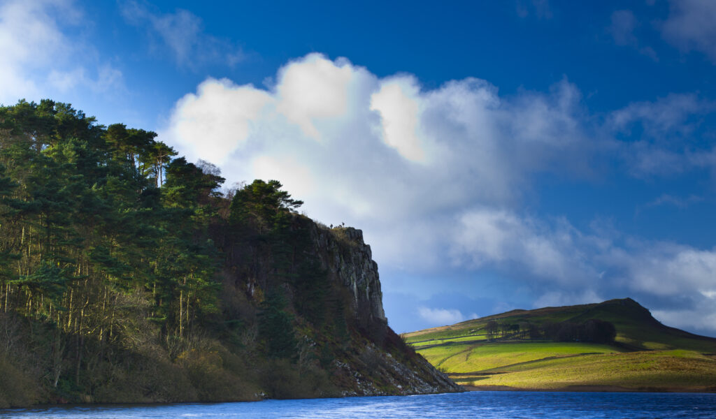 England, Northumberland, Hadrian's Wall. Crag Lough and the Great Whin Sill, viewed from near one of the most dramatic stretches of Hadrian's Wall.